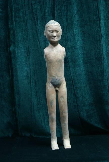 134. Inventory number: YG2170 Object title: Painted male warrior figure (naked, original clothes and wooden arms have not survived) Dimensions: Height 57cm; Width 9.
