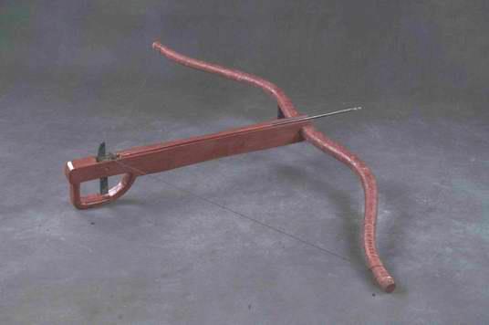 177. Inventory number: QYLF020 Object title: Replica crossbow Dimensions: Length 143cm; Width 86cm Materials: Wood and leather Date made: Modern Emperor Qin