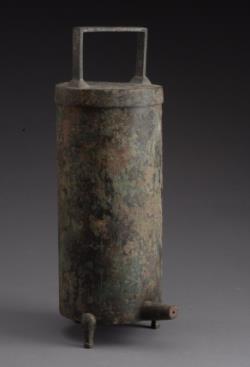 23. Inventory number: 3057 Object title: Cylinder-shaped water clock Dimensions: Height 32.3cm; Diameter 11.