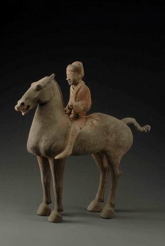 96. Inventory number: Yqd020 Object title: Painted cavalryman figure on a horse Dimensions: Height 68cm; Length 63cm Material: Pottery Date made: Han Period (206 BCE 220