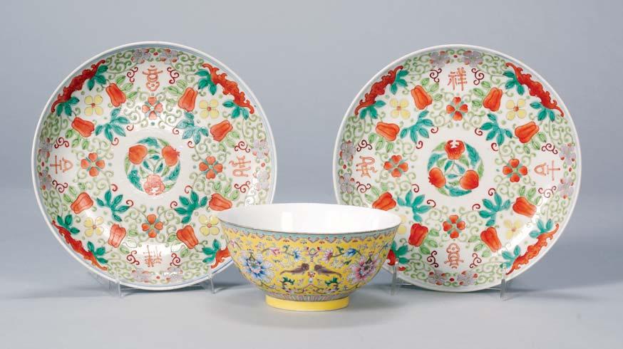509 510 509 510. Famille Rose Bowl, China, 19th century, yellow ground with stylized lotus and double fish, Ch ien Lung mark on the base, dia. 6 1/4 in. 511.