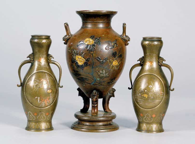 389 390 389 389. Three Mixed-Metal Vases, Japan, late 19th/early 20th century, a pair decorated with water plants and one decorated with irises, ht. 8 1/2, 5 in. 390. Mixed-Metal Vase, Japan, 19th century, inlaid design of flowers and peaches, ht.