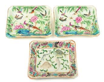 * 500-700 526 A pair of Canton famille rose dishes and one similar of shaped rectangular form, the pair painted with exotic birds, butterflies, bamboo,