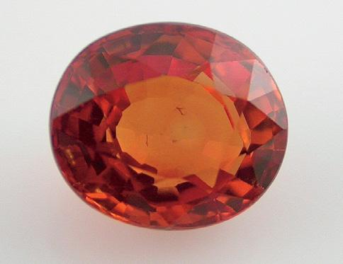 Figure 25. This 2.16 ct brownish orange sapphire displays a color typically associated with Be-diffusion treatment. Photo by G. Choudhary.