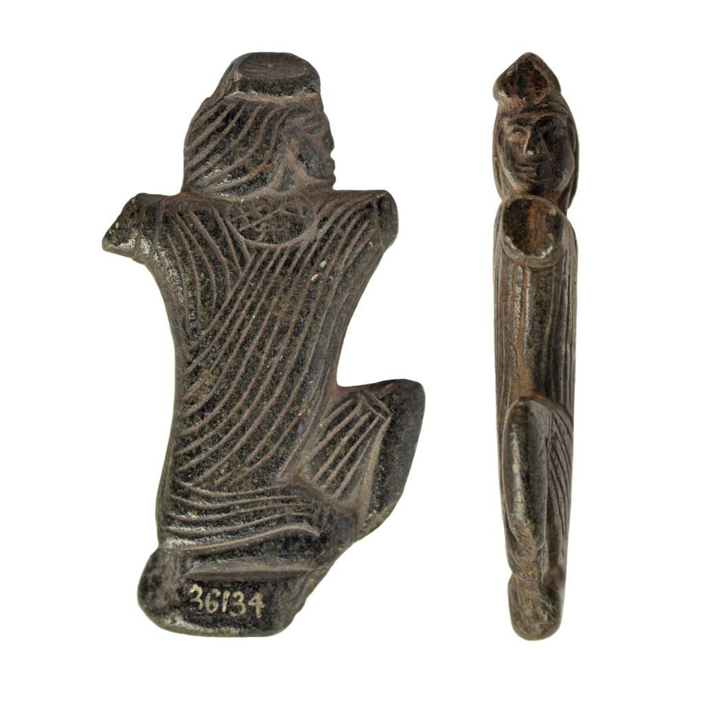 A variant of this latter type is represented by a fragmentary spoon depicting a kneeling female figure raising up her hands (Gardner 1888, 58, pl. XIV no.