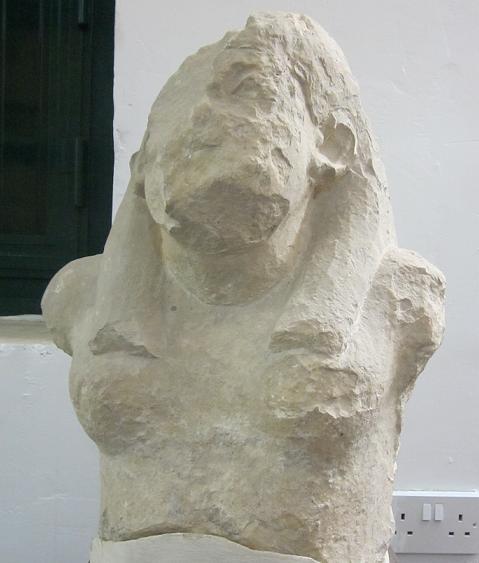 4.8 Broken Statue Material: Limestone Origin: Unknown Form:
