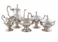 SILVER 400 405 Collection of sterling silver table articles (11) comprising: 4 Pot de creme holders, cream pitcher and matching sugar bowl, Morgan dollar dish, salt & pepper set, urn form toothpick