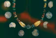 Most probably, the coins came via Africa and the Eastern routes to the North. The bead necklace is highly valuable and reflects the Viking s international connections, power and social status.
