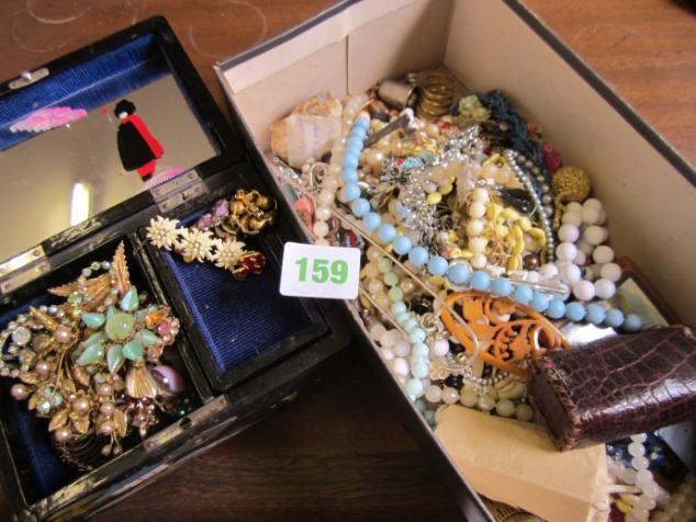 containing assorted brooches, plus badges