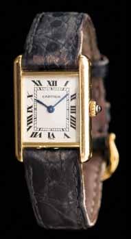 8 9 8 An 18 Karat Yellow Gold Tank Wristwatch, Cartier, 28.50 x 20.