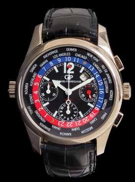 39 39 An 18 Karat White Gold Ref. 4980 World Time Wristwatch, Girard Perregaux, 43.