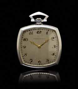 52 52 A Platinum and Diamond Open Face Pocket Watch, Audemars Piguet, the case back with applied central accent containing numerous round single cut diamonds weighing approximately 0.