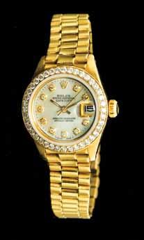 138 An 18 Karat Yellow Gold and Diamond Ref. 6917 Oyster Perpetual Datejust Wristwatch, Rolex, Circa 1982, 26.