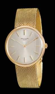 153 An 18 Karat Yellow Gold Ref. 3470 Wristwatch, Patek Philippe, Circa 1960, 39.