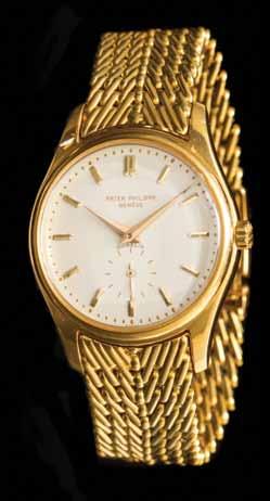 163 A Fine 18 Karat Yellow Gold Ref. 2526 Mechanical Wristwatch, Patek Philippe, Circa 1955, 36.