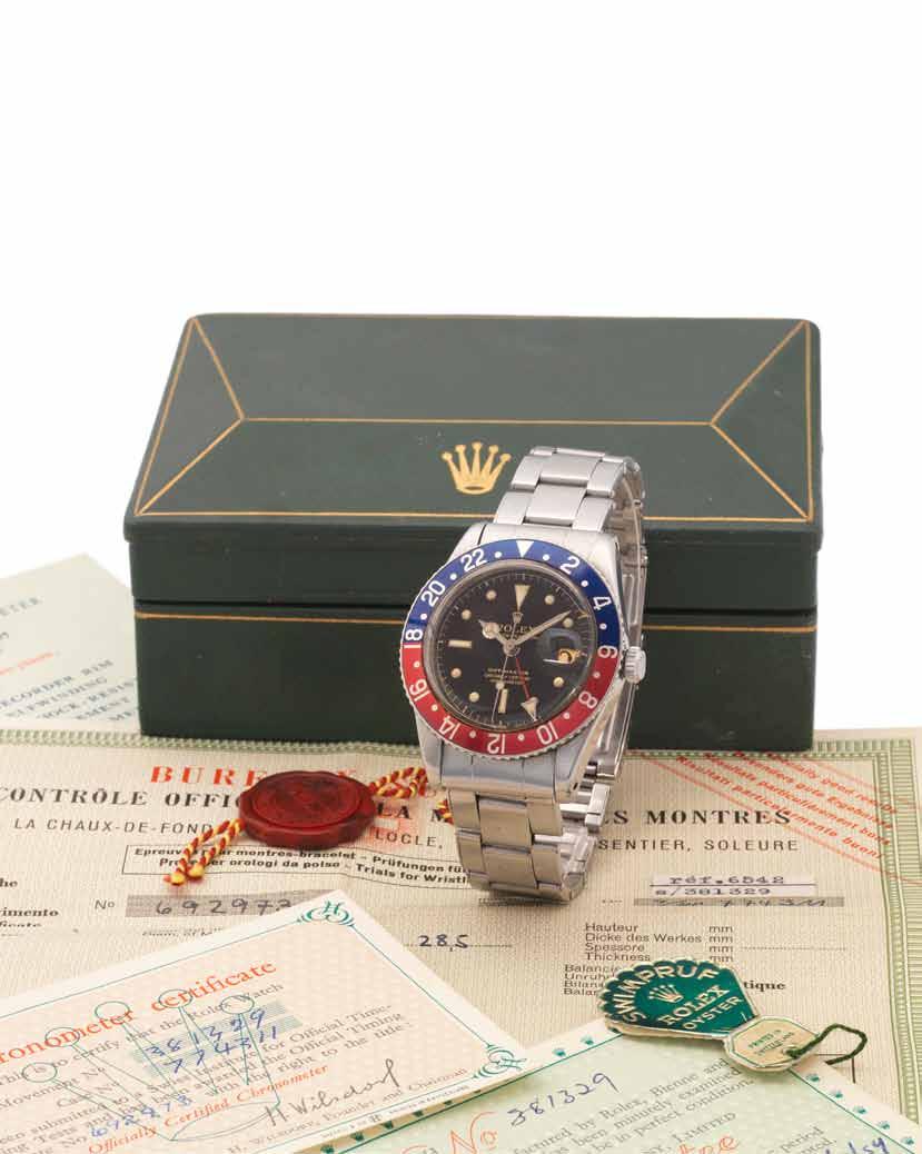 435 Rolex. A rare and early stainless steel automatic dual time wristwatch with original guarantee, bill of sale, swing tag and chronometer papers GMT-Master, Ref:6542, Made in 1958 26-jewel Cal.