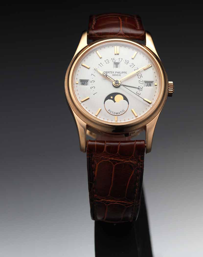 230 Patek Philippe. A fine and rare rose gold perpetual calendar wristwatch with retrograde date and phases of moon together with fitted Patek Philippe wooden box Ref:5050, Case No.