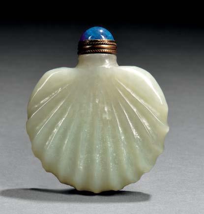 36 37 with back detail 36 Pale Celadon Jade Snuff Bottle, China, in the form of a peacock s tail or a fan, with a blue Peking glass