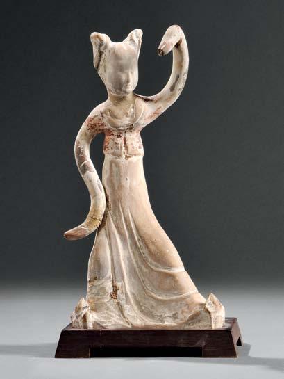 $3,000-5,000 51 Painted Pottery Figure of Dancing Lady, China, Tang dynasty-style, depicting a court lady dancing with one arm up,