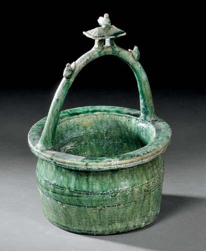 $800-1,000 53 Green-glazed Pottery Well-head, China, Han dynasty-style, with three pottery birds perched on the roof and pulley, a band of incised geometric patterns