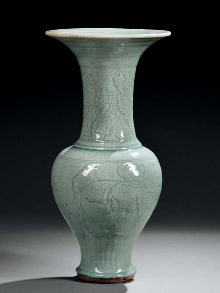 99 99 Longquan Celadon Yen-Yen Vase, China, Yuan dynasty, baluster-shape with trumpet mouth and waisted neck and bottom, resting on an unglazed foot ring, decorated with molded flowers and leaves in
