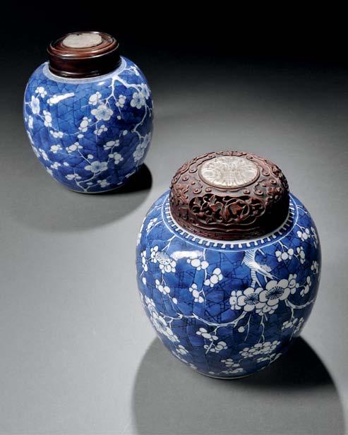110 111 110 Two Blue and White Covered Jars, China, late 19th/early 20th century, each similarly decorated with an overall hawthorn blossom and branch pattern against a cracked ice ground, a
