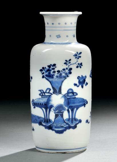 112 113 112 Blue and White Rouleau Vase, China, Qing dynasty, with slightly waisted neck and everted mouth, resting on a short unglazed foot rim, the body painted with auspicious symbols and scholar