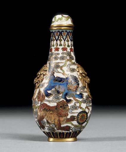 1 1 Cloisonné Snuff Bottle with Shishi Lions, China, Qing dynasty, elongated pear-shape with slightly flattened body, round mouth rim, and short oviform foot, decorated with a lion s head with a ring