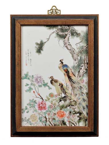 131 Famille Rose Porcelain Plaque, China, Republic Period, depicting a pair of parrots perched on a peony branch, a waterfall below, marked with a red seal