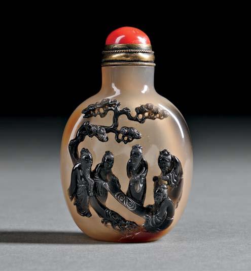 3 3 Agate Snuff Bottle with Figures, China, 18th/19th century, flattened oviform, slightly widening at the neck, well-hollowed, decorated with five Daoist figures unrolling a scroll under an old pine