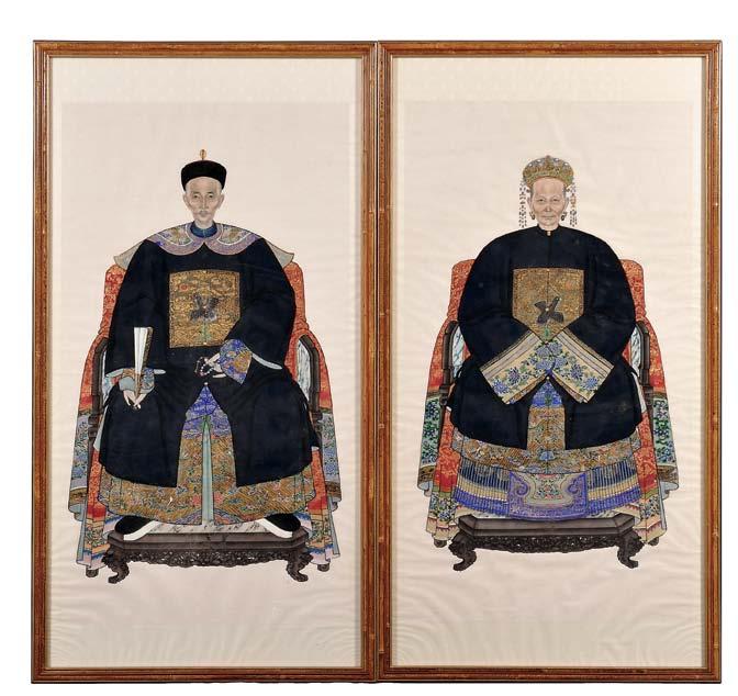 163 163 Pair of Ancestral Portraits of a Couple, China, 20th century, both sitting upright in a chair, dressed in formal robes, with their feet on a footrest, the man holding a fan in his right hand