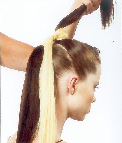 additional ponytail of a different color.