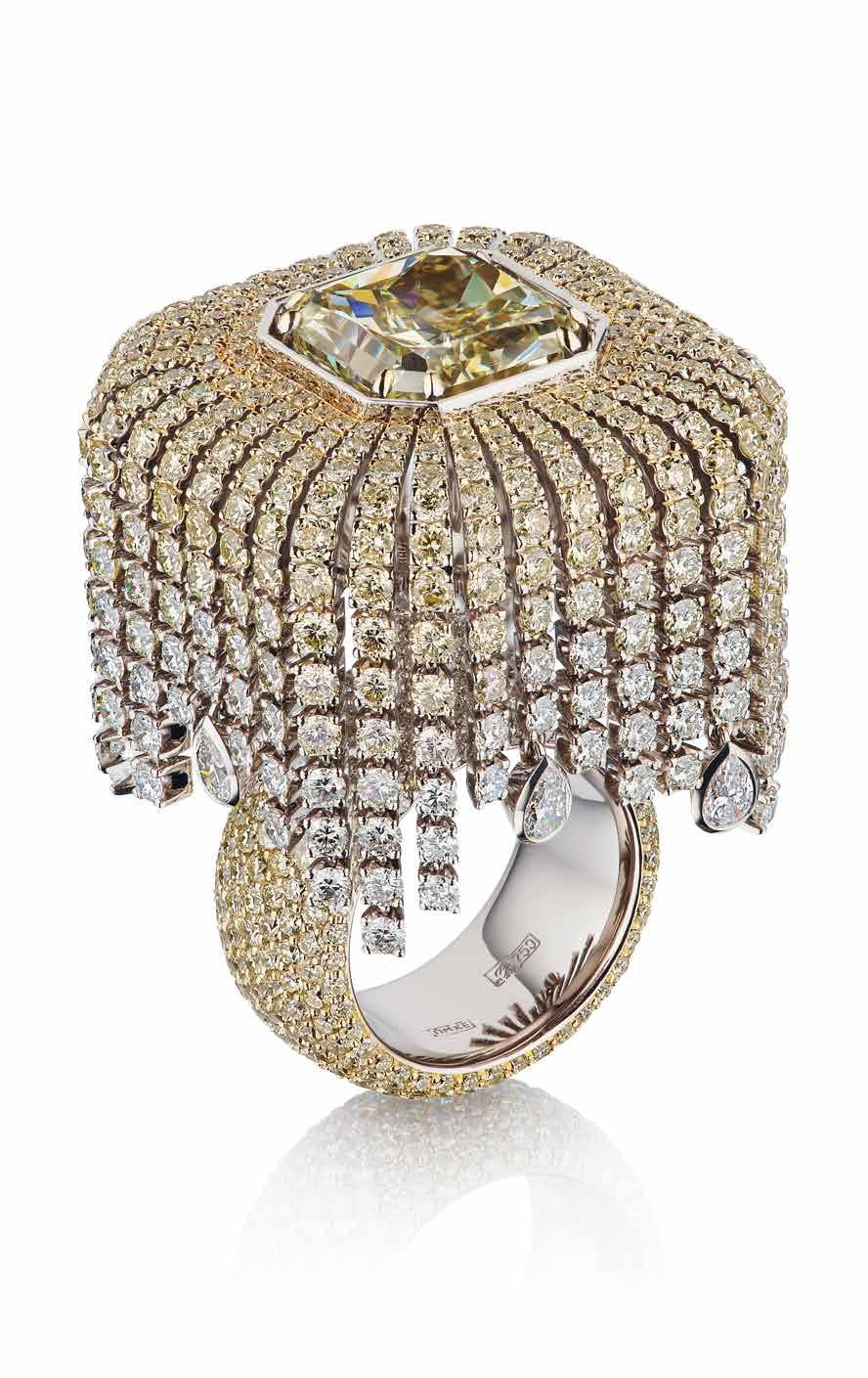 The effect is compounded by the fact that the diamonds are also delicately colour graded in tones of light yellows and whites; in addition, the fringes of diamonds have