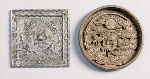 Belt Hook, China, Warring States period (6th-3rd century B.C.), Huai style, bronze inlaid with gold and silver dragons, lg. 11 1/2 Provenance: Ex-collection of Robert H. Ellsworth. $1,500-2,500 350.