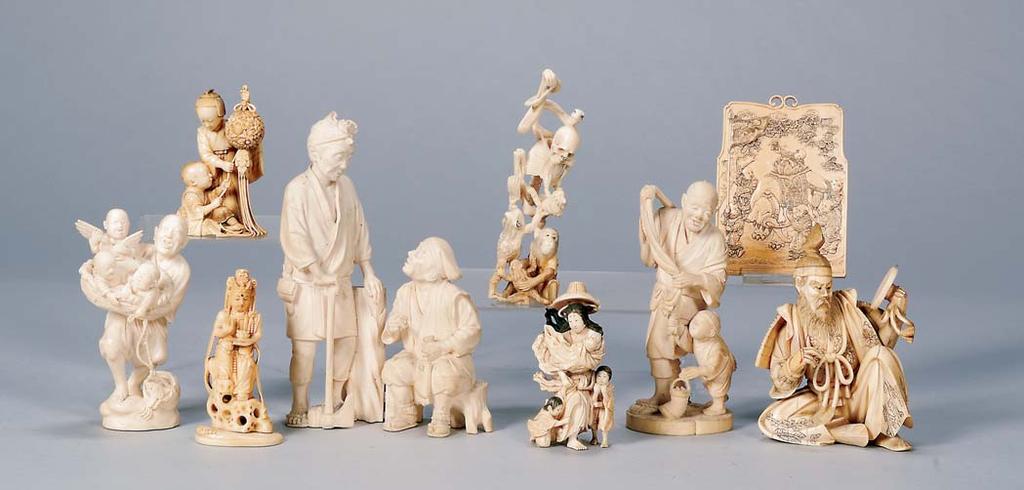 3 1/2 264. Ivory Carving, Japan, 19th century, Tokyo school, scene of two men having a conversation, ht. 7 265.