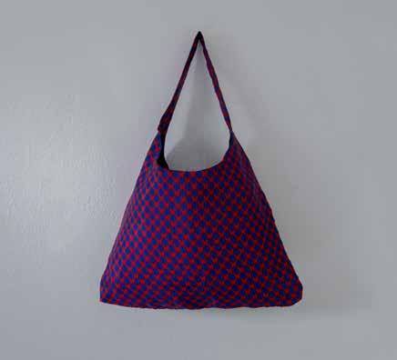 TRAPEZE BAG This geometric bag is a practical and elegant weekend or holiday staple that fits most needs.