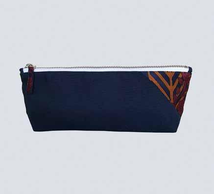 accessory, this playful pencil pouch combines upcycled saris with an elegant look.