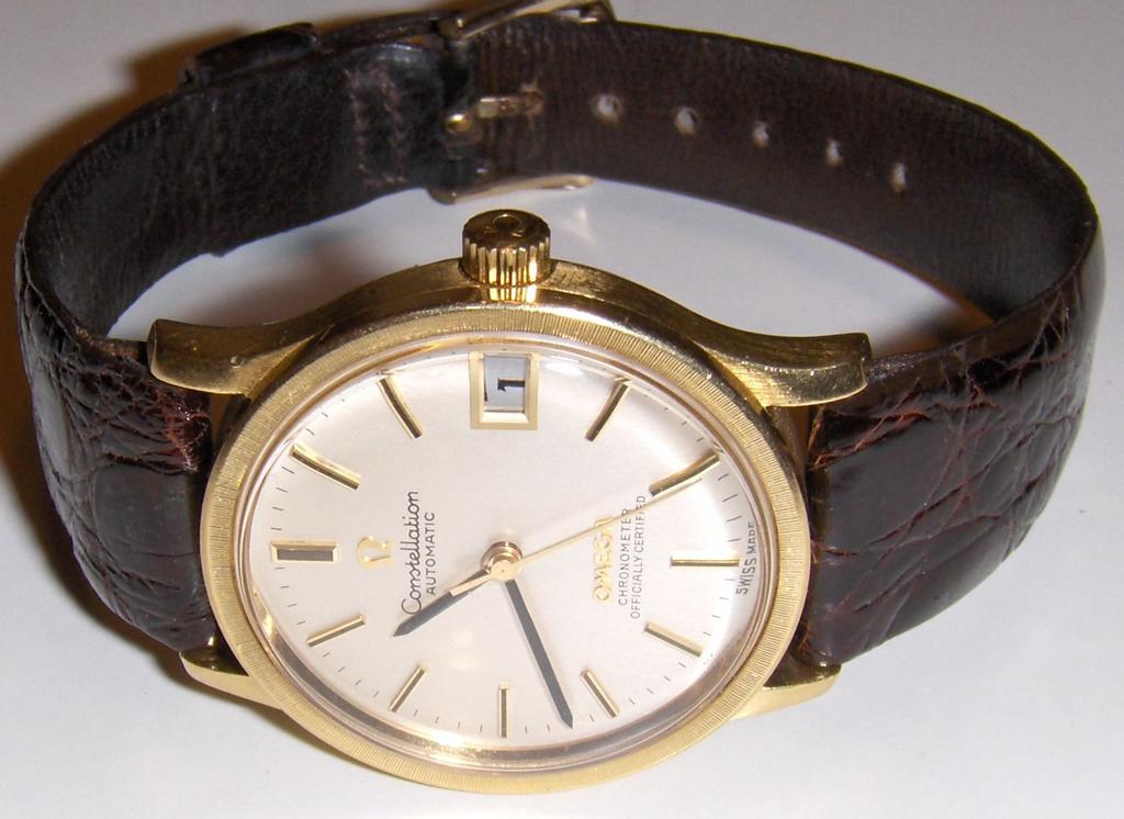 18K gold, selfwinding, plastic crystal, date, original bracelet, foldingclasp, approx 1967.