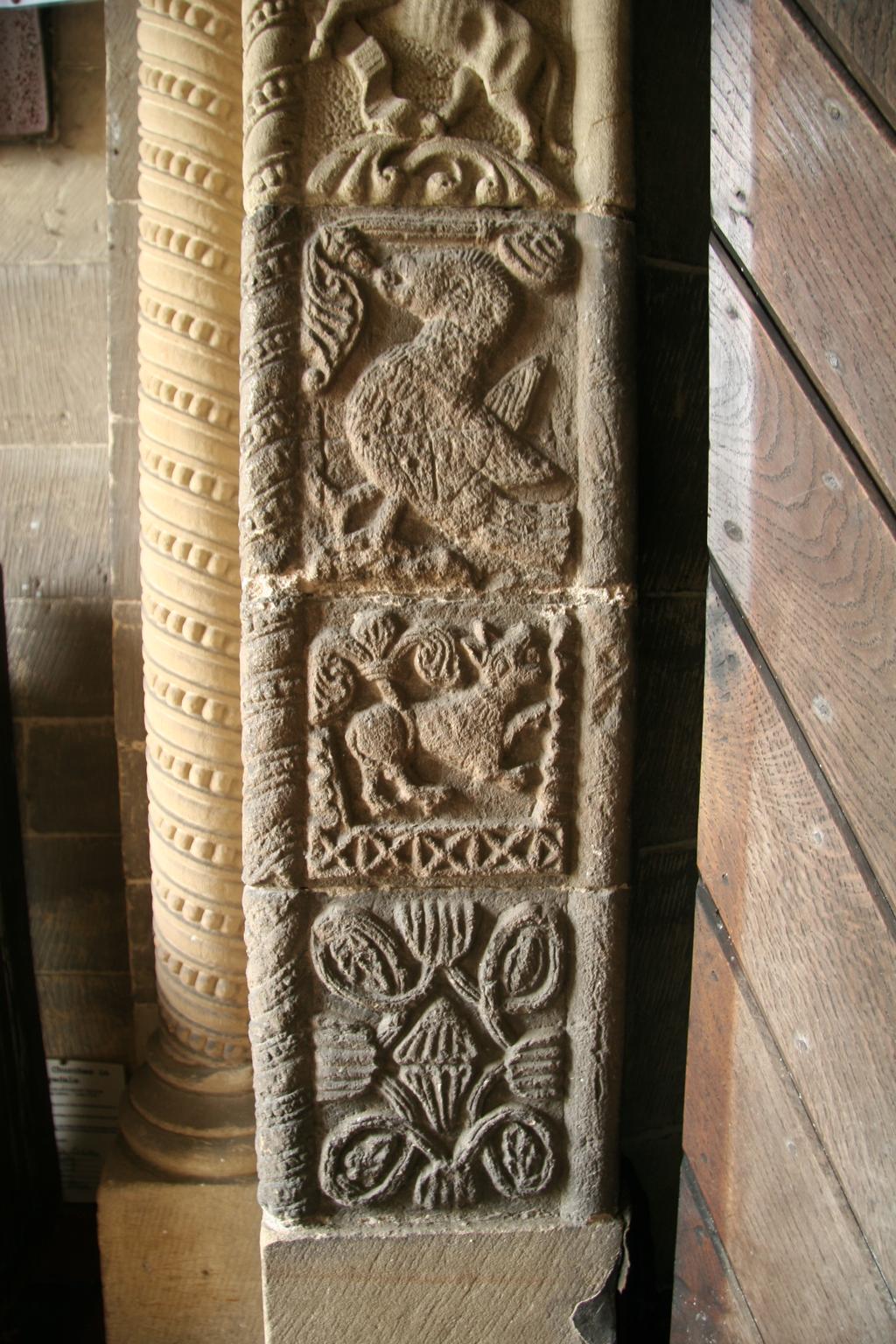 The flat carving of this hoodmould is more reminiscent of Anglo-Scandinavian art than late Romanesque.