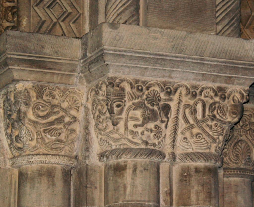 Fig 7 Detail of the chancel arch capitals (north), showing the free-flowing acanthus carving across the face of the capitals. Note the Victorian capital to the far right.
