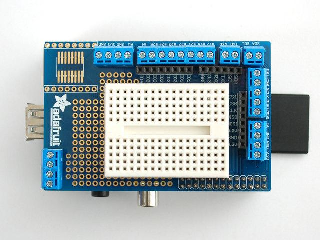 We designed the plates so you can fit a 'tiny breadboard' (http://adafru.