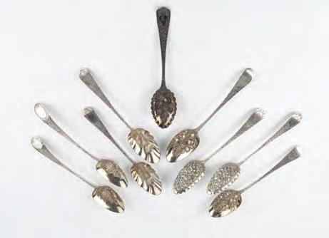 flatware, an Indian white metal cream jug, a Peruvian dish, a toast rack, various napkin rings, a mustard, and a lighter (qty) 80-120 (plus 24% BP*) 600.