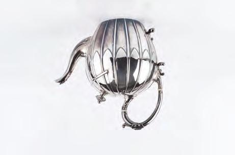 A LATE VICTORIAN SILVER PLATED JAMES DIXON PATENT SYP (SIMPLE YET PERFECT) TEAPOT, of melon form, with detachable cover, the base with stamped