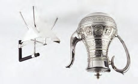 646. A VICTORIAN SILVER PLATED COFFEE POT by Edward & Sons, embossed with the signs of the zodiac; and a collection of further silver plated items to include a 19th Century bacon dish, a spoon