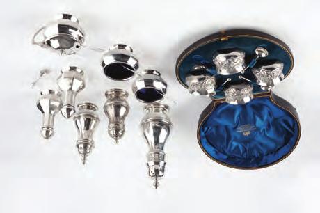 silver fruit knives with mother of pearl handles, cased; a set of silver handled King s pattern tea knives, cased; a silver child s spoon, fork and pusher, cased; and a set of six silver coffee