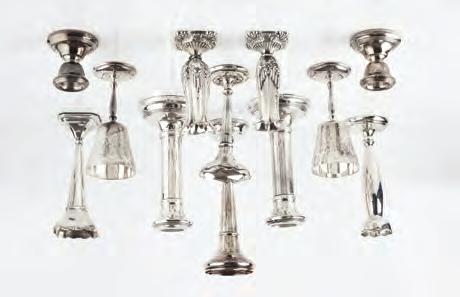 731. A PAIR OF SILVER CANDLESTICKS, on reeded circular bases, Birmingham 1923, 16cm high; a similar pair of silver dwarf candlesticks, a pair of silver goblets with engraved decoration,