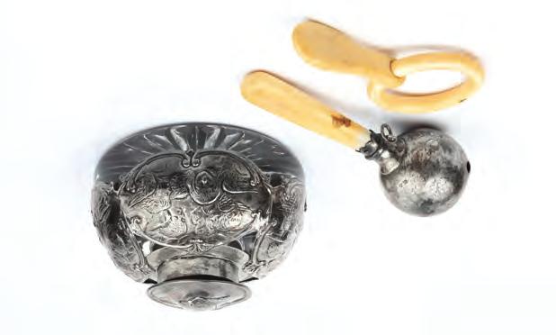 A GEORGE III SILVER NUTMEG GRATER, of navette form, with pricked and bright cut decoration, by Thomas Phipps & Edward Robinson, London 1809, 5cm long 300-400 (plus 24% BP*) 398.