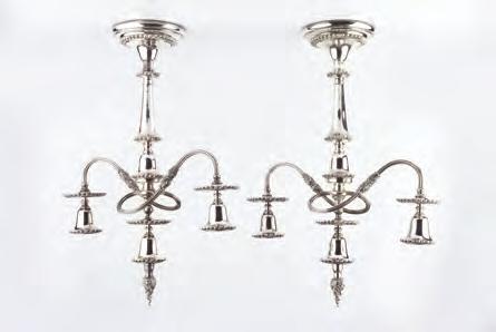 A PAIR OF SILVER PLATED TWIN BRANCH THREE LIGHT CANDELABRA, with gadrooned borders, and reeded detachable branches, 48.5cm high overall (2) 70-100 (plus 24% BP*) 453.