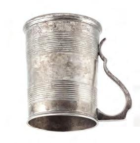 A MID VICTORIAN SILVER MUG of tapered form, with reeded decoration and glass bottom by Daniel & Charles Houle, London 1861, 11.5cm, 11 oz all in 480.