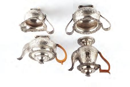 496. A VICTORIAN SILVER PLATED FOUR PIECE TEA AND COFFEE SERVICE, with floral and scroll cast borders, and florally embossed decoration, coffee pot 23cm high (4) 40-60 (plus
